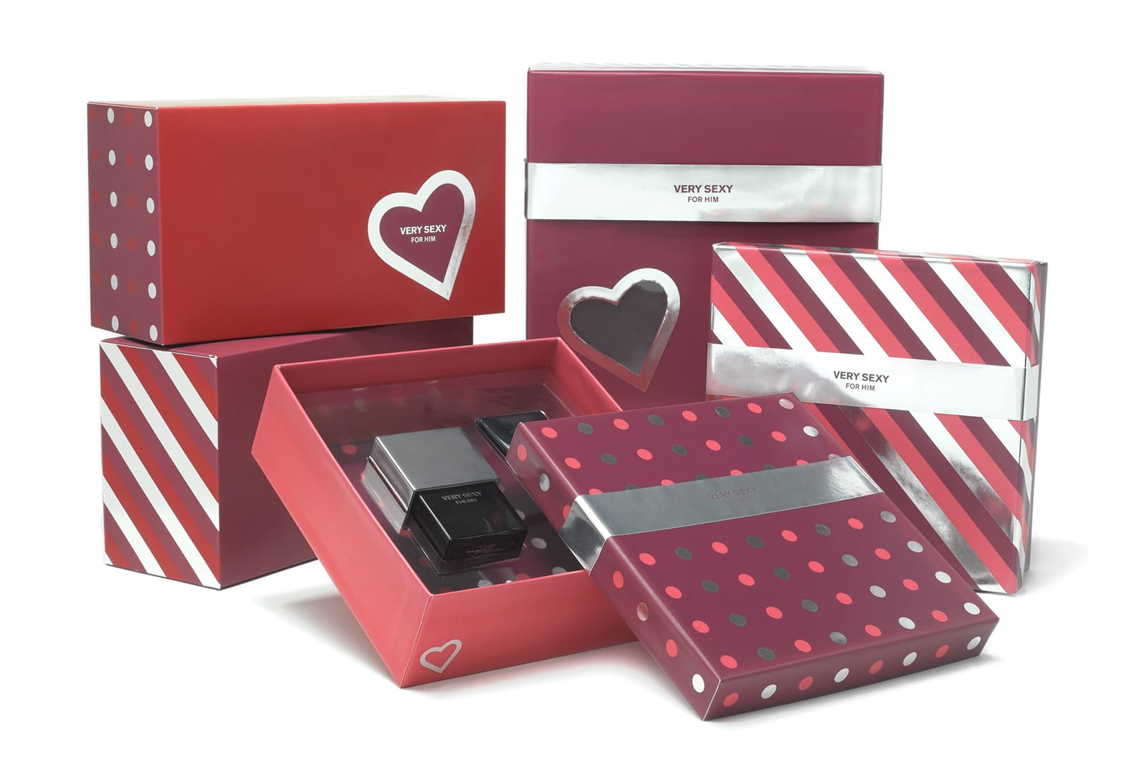 Victoria's Secret Very Sexy For Him box design in silver and red with polka dots, diagonal stripes, and heart icons.