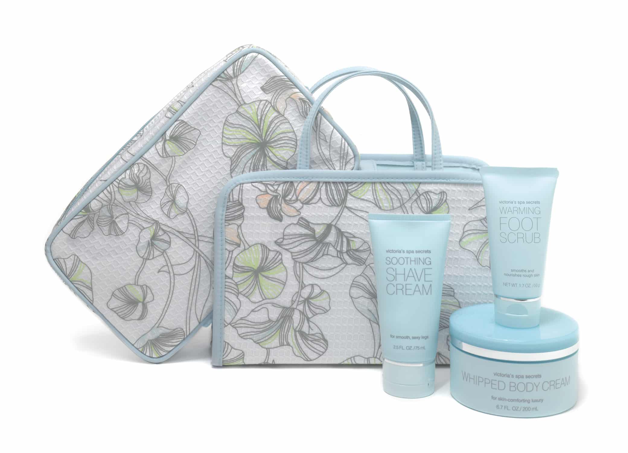Victoria's Secret Spa Secrets travel set packaging design showcasing light blue lotions and pouches with floral designs.