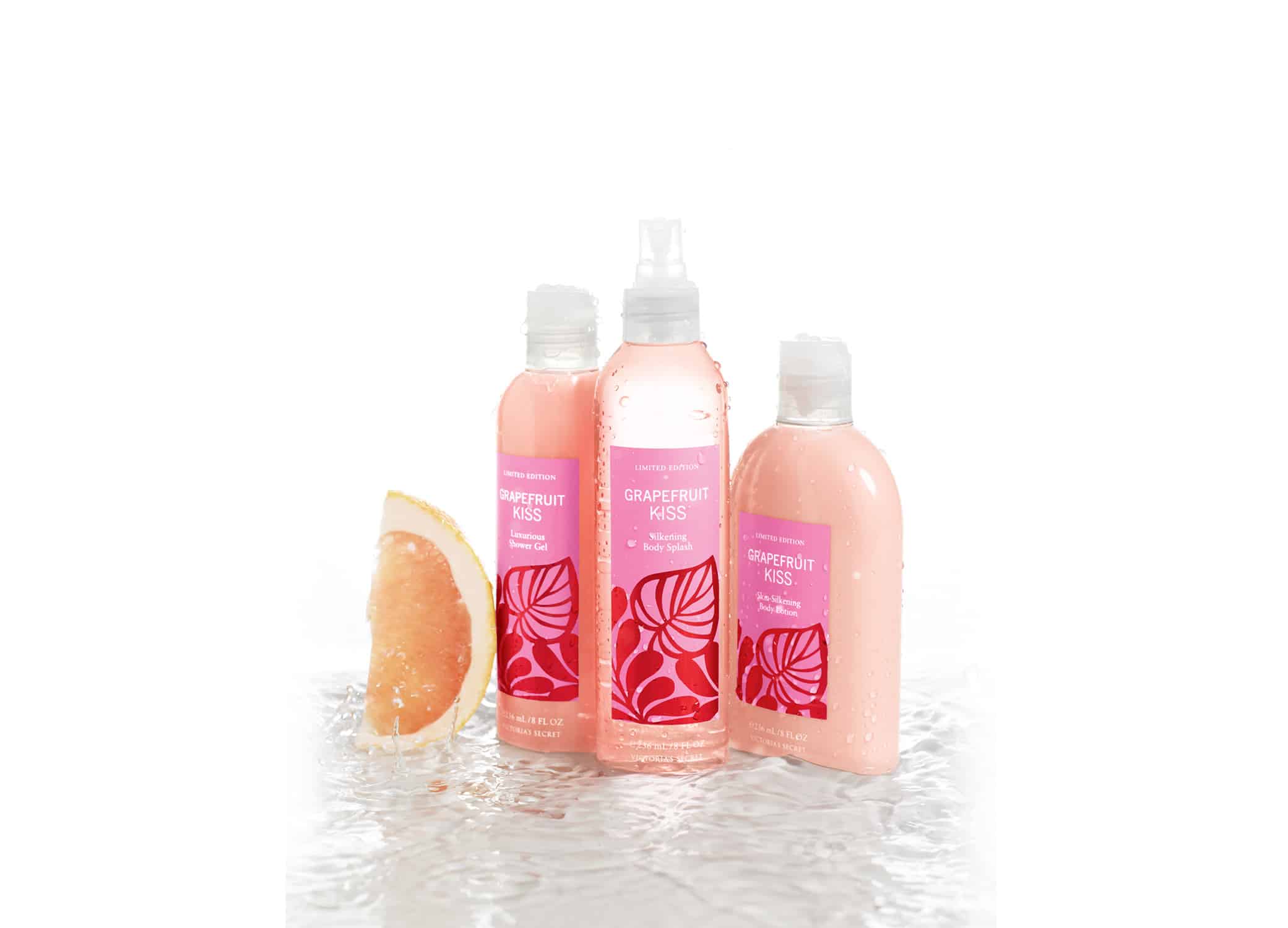 Packaging for bath and body products Victoria's Secret Summer Promo Grapefruit Kiss line in pink and red color palette and grapefruit slice.