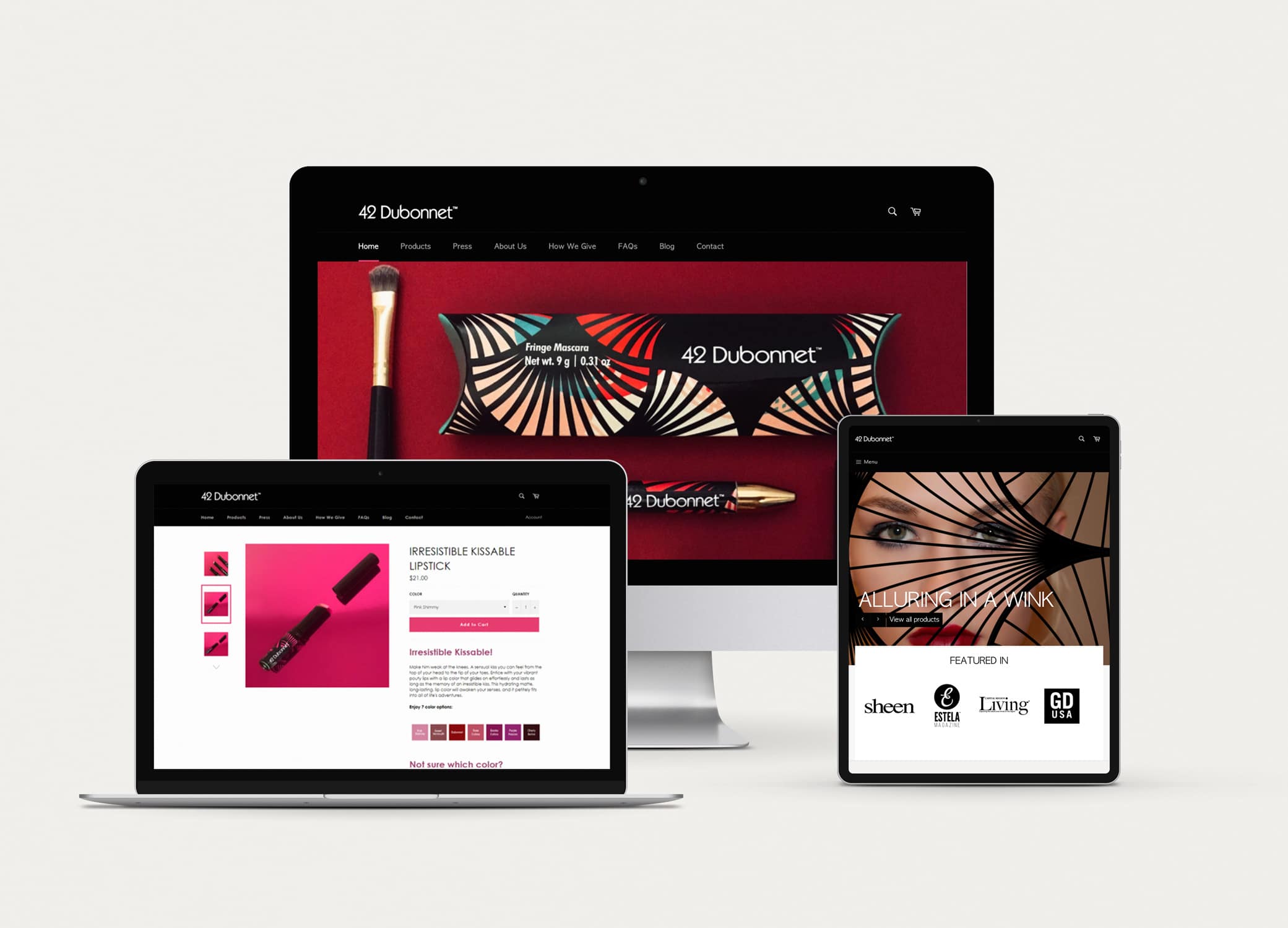 42 Dubonnet website homepage design in black with hero image of makeup packages splashed against burgundy backdrop.