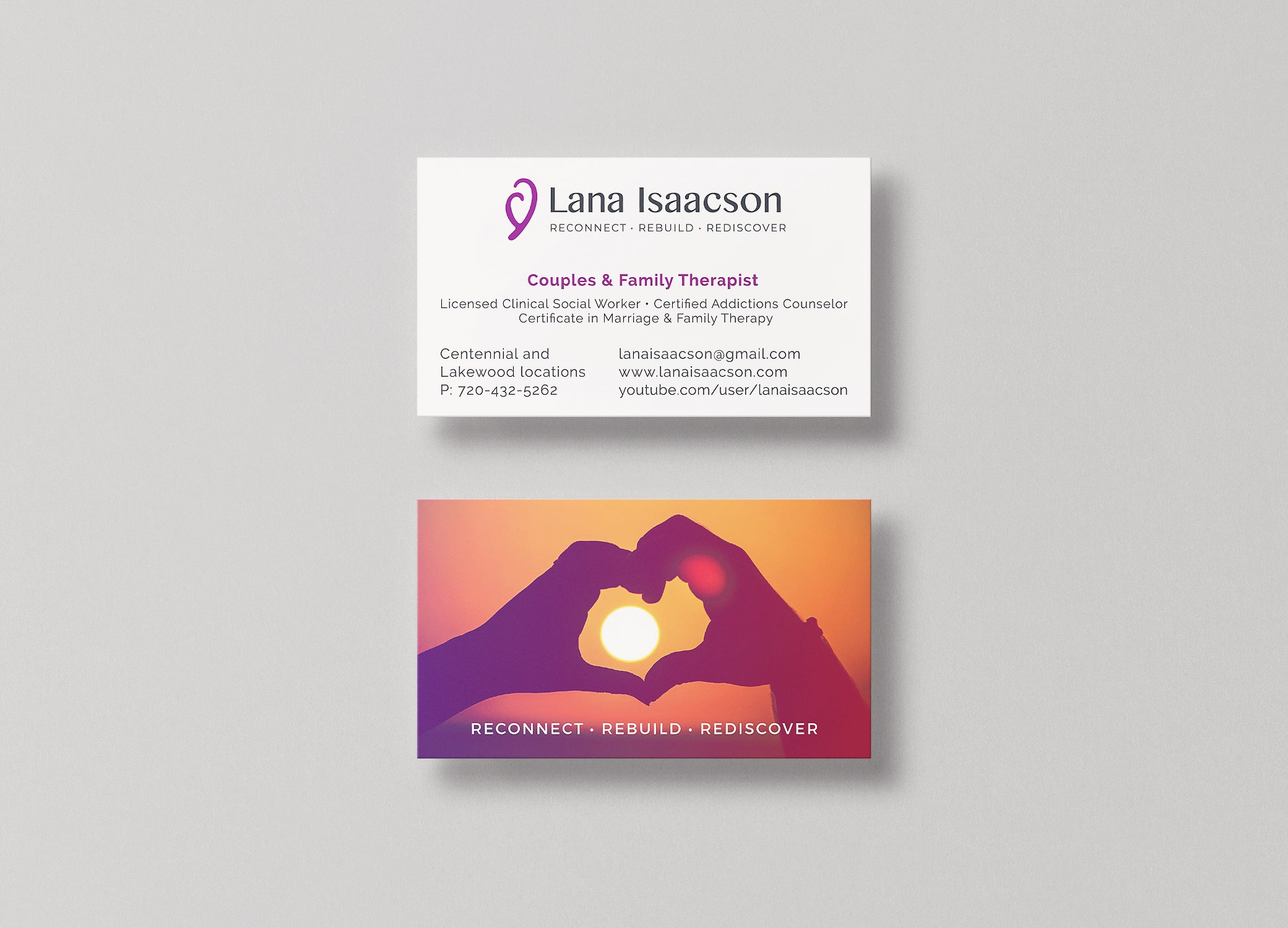 Lana Isaacson branding for therapists business cards arranged in stacks to show front and back view against a light grey backdrop.