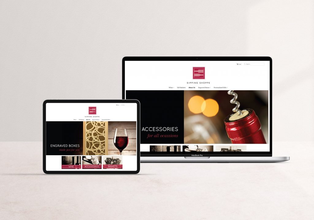 How Can I Sell Alcohol Online? Sipping Shoppe luxurious website design featuring the homepage with dark red and black features on laptop and ipad mockups.