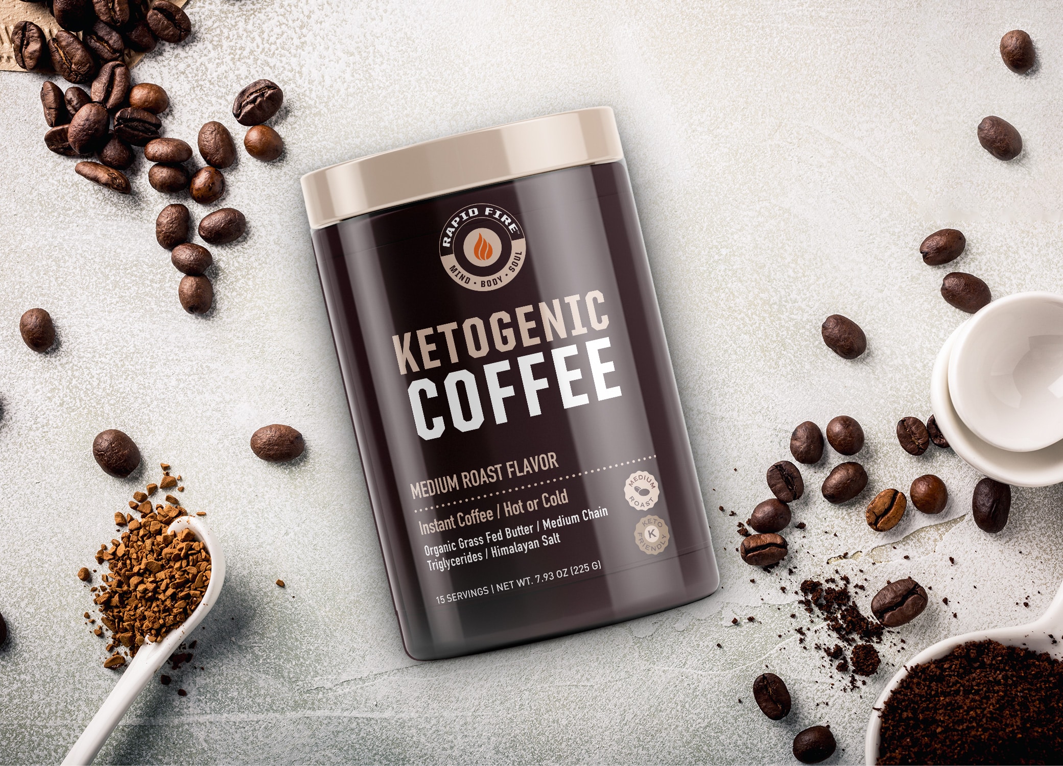 Rapid Fire ketogenic coffee medium roast flavor packaging design with coffee beans surrounding the container on a light stone background.