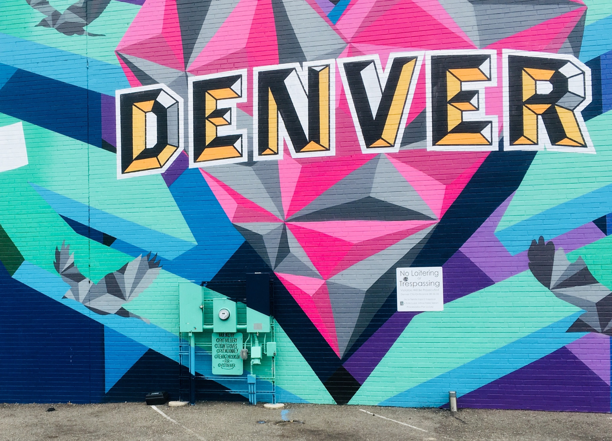 Colorful graffiti wall art showcased on building in Denver, Colorado.