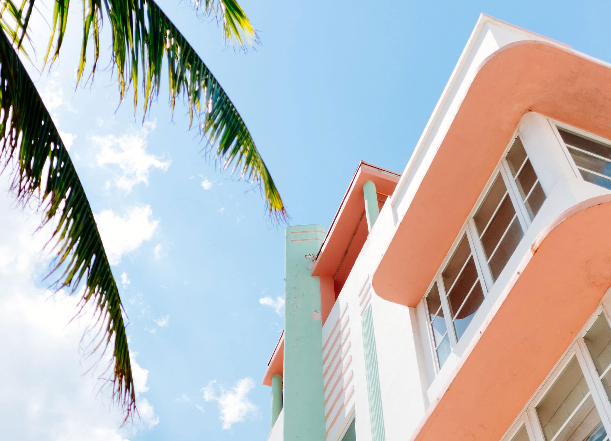 Graphic Design Agency located in Miami Florida, image showing colorful building and palm tree.