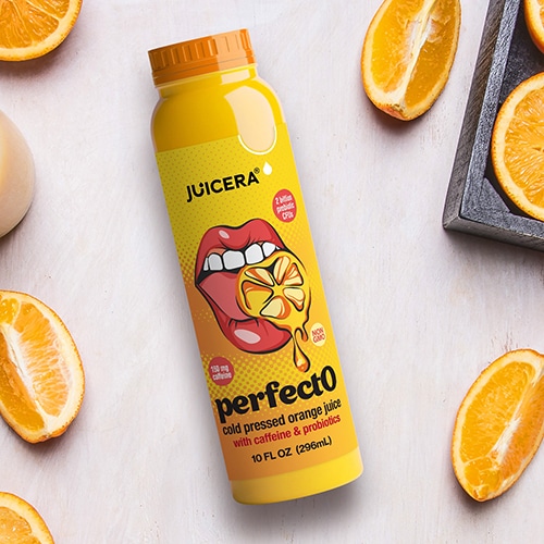 Juicera PerfectO pop art energy drink label design in bright yellow shown with orange slices.