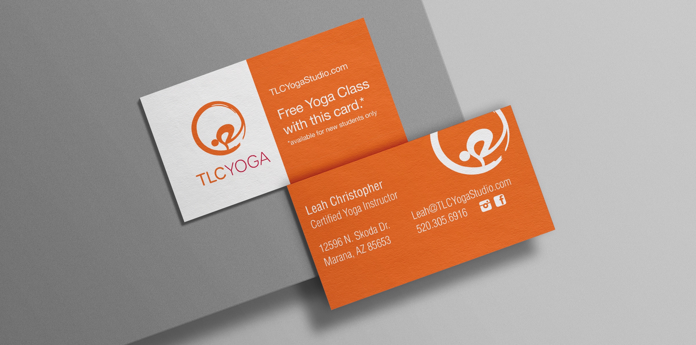 TLC Yoga studio logo shown on orange and white business cards against a grey background.
