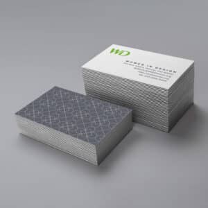 Women in Design white business cards to show front and back grey color palette arranged in columns.