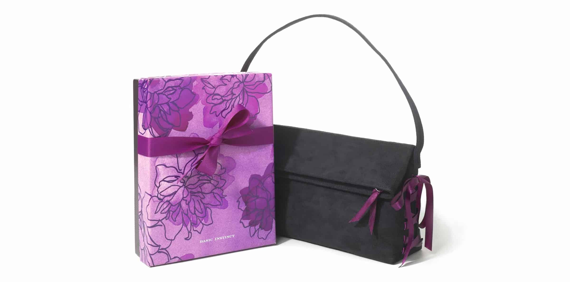 Design gift box packaging for Victoria's Secret Basic Instinct gift set design with black handbag and floral box.