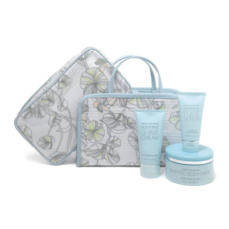 Travel gift bag design for Victoria's Secret Spa Secrets travel gift bag design showcasing light blue lotions and pouches with floral designs.