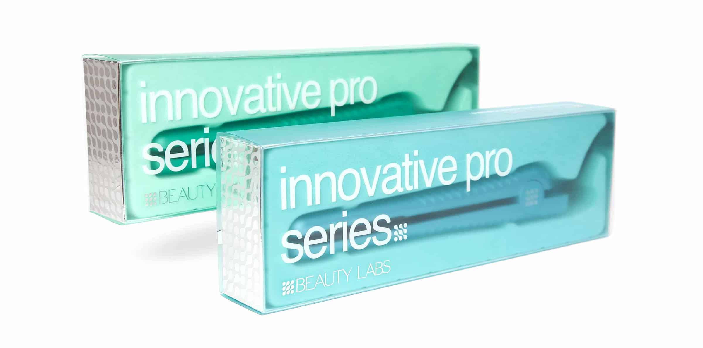 Beauty Labs minimalist packaging design including two flat irons in aqua blue and green against white backdrop.