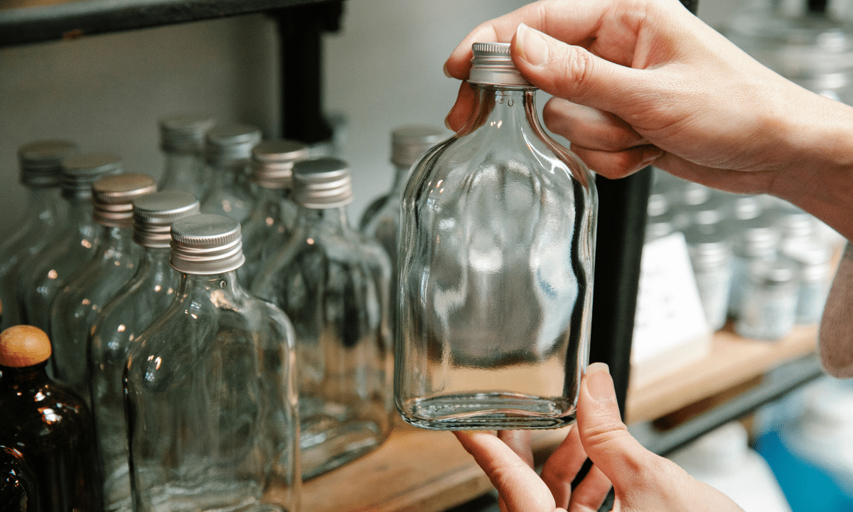 Mocktail packaging options including glass bottles on store shelf.