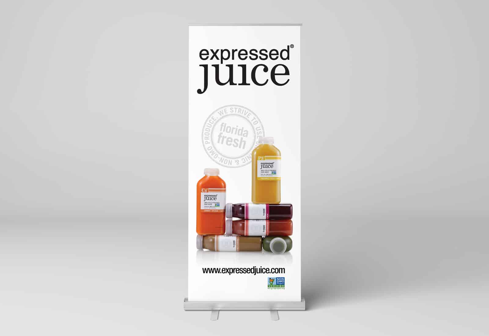 Expressed Juice banner including the logo and stacked configuration of bottles.