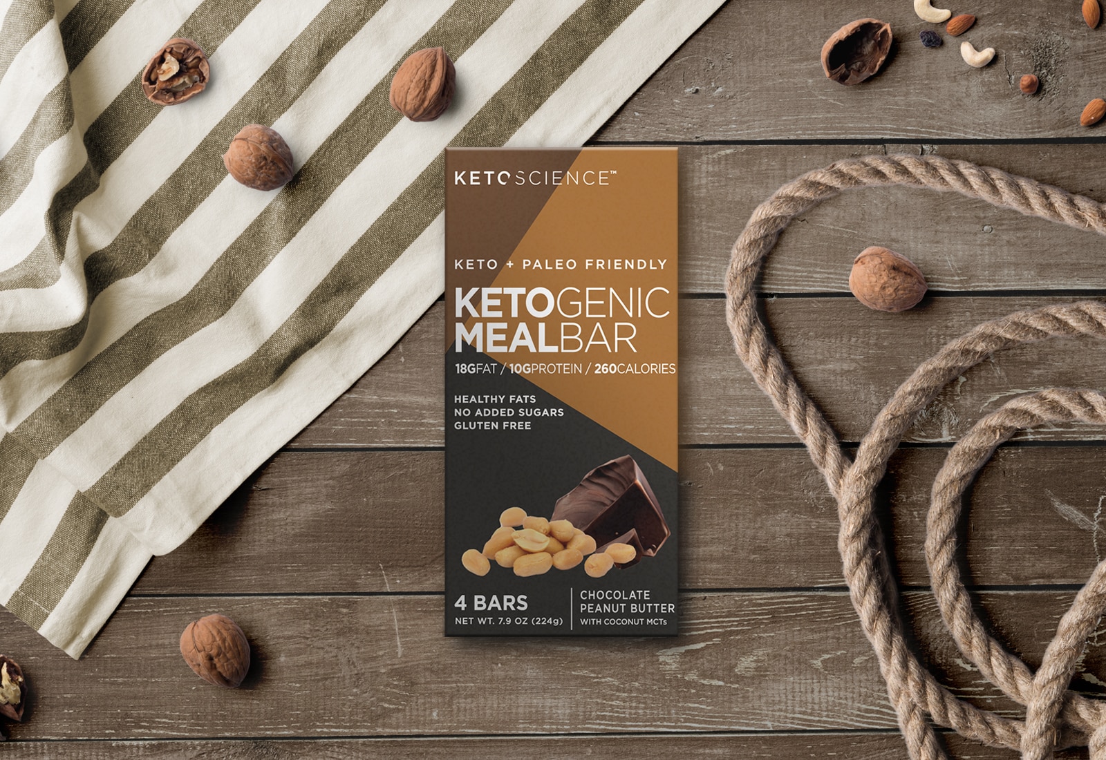 The final design for a box of ketogenic meal bars with black and shades of brown contrasting geometric shapes