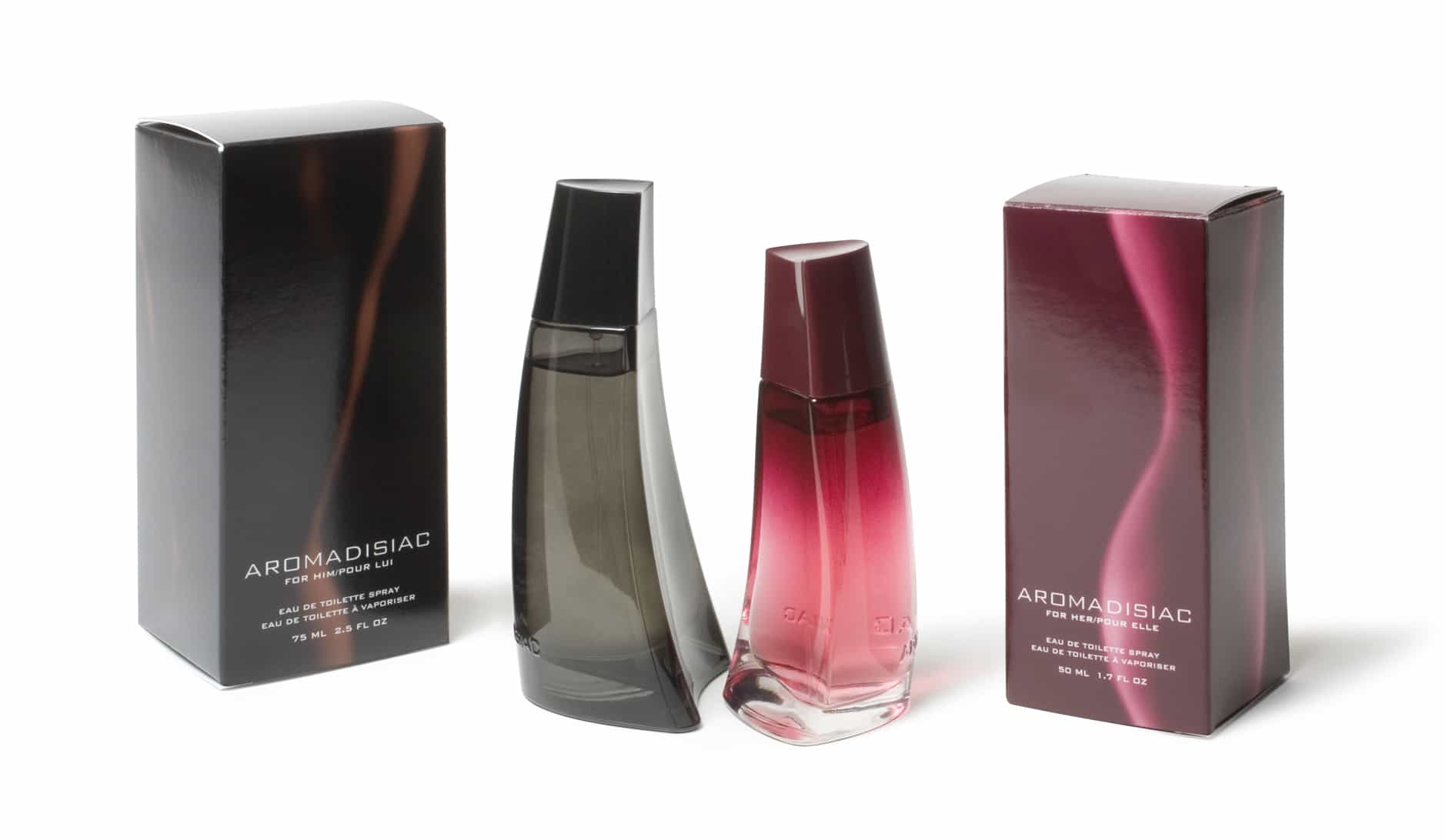 A duo fragrance bottle set designed to fit within each other with black and deep pink fragrance boxes to match each product