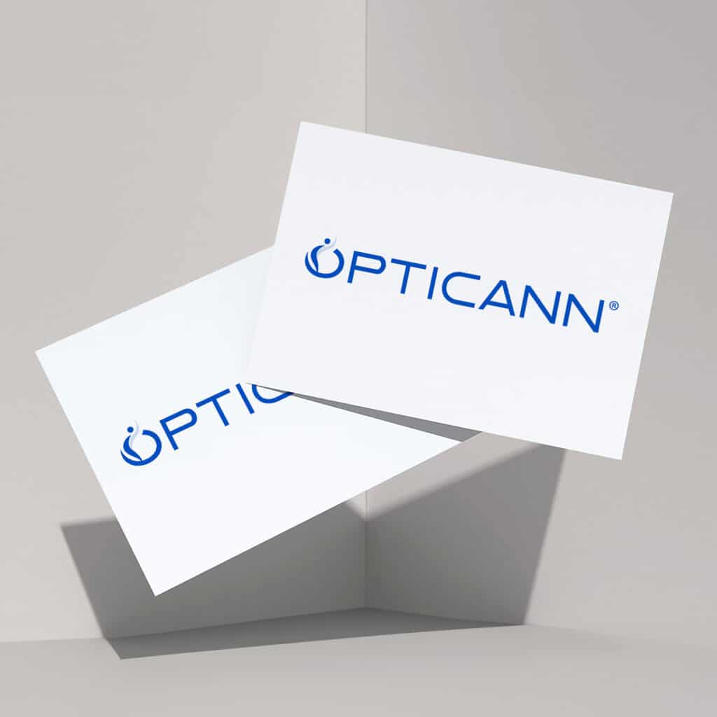 Opticann logo design on two floating business cards